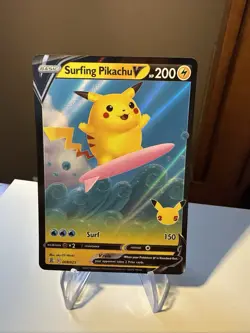Pokemon Celebrations Surfing Pikachu V 008/025 Holo. Pack Fresh Ships ASAP! - Image 1
