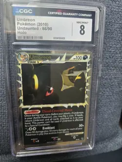 Pokemon TCG 2010 Undaunted Umbreon Prime 86/90 Ultra Rare Holo CGC 8 - Image 1