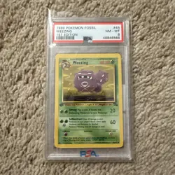 1999 Pokemon Fossil 1st Edition 45 Weezing PSA 8 NM-MT - Image 1