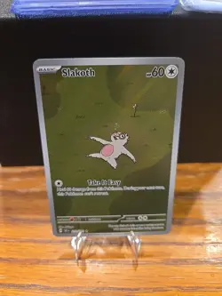 Pokemon TCG Slakoth 212/191 Sv08: Surging Sparks Illustration Rare Holo Card - Image 1