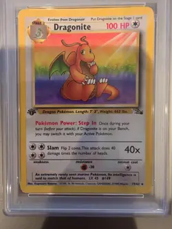 1999 POKEMON FOSSIL #19 DRAGONITE-HOLO 1ST EDITION - Image 1