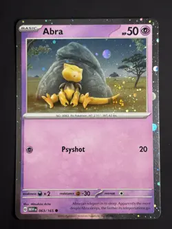 POKEMON ABRA 063/165 COSMOS HOLO NICE SWIRL SCARLET & VIOLET 151 CARD - Image 1