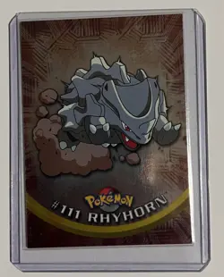 Rhyhorn #111 HOLO FOIL TOPPS Pokemon Card 2000 Nintendo Blue Label EXC - Image 1