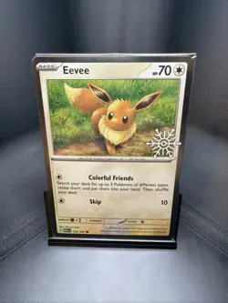 EEVEE 133/165 (Holiday Calendar) Stamped COSMOS HOLO 2023 Pokemon SV: 151🔥 - Image 1