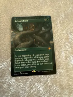 Sylvan Library (Borderless) Dominaria Remastered Regular - Image 1