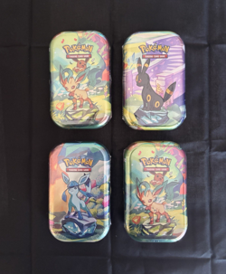 POKEMON PRISMATIC EVOLUTIONS MINI TIN NEW/SEALED MINT - ASSORTED TINS - Image 1