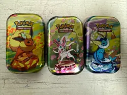 3 X Pokemon TCG Prismatic MINI TINS. Flareon, Vaporeon, & Sylveon EMPTY NO PACKS - Image 1