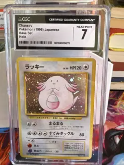 1996 POKEMON BASE SET JAPANESE #113 CHANSEY-HOLO CGC 7 - Image 1