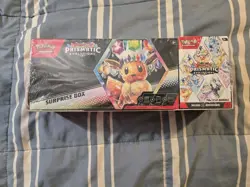 Sam’s Club Exclusive Pokemon Prismatic Evolutions Surprise Box & Booster Bundle - Image 1