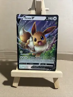 Pokemon TCG SWSH065 Eevee v Black Star Promo Holo Card - Image 1