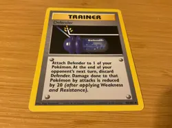 New 1995 Base Pokemon Card #80/102 "Trainer Defender" - Image 1