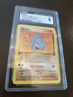 1999 Pokemon Jungle 1st Edition #61 - Rhyhorn CGC 9 - Image 1