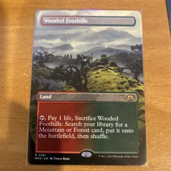Wooded Foothills - Borderless Near Mint, English Modern Horizons 3 MTG Magic NM - Image 1