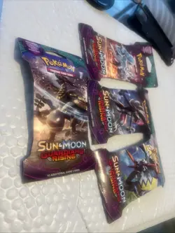 Pokemon Sun and Moon Guardians Rising Sleeved Boosters Lot Of 4 dented sleeve - Image 1