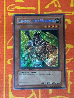 YUGIOH ELEMENTAL HERO WILDHEART SECRET RARE LIGHT PLAY EHC2-EN003 - Image 1