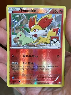 POKEMON FENNEKIN 10/124 COMMON REVERSE HOLO FATES COLLIDE PROMO LEAGUE LP - Image 1