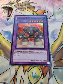 Yugioh - Elemental HERO Mudballman LCGX-EN053 NM Unlimited Super Rare - Image 1