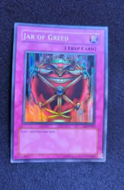Yu-Gi-Oh Jar of Greed Super Rare Unlimited Edition LON-047 - Image 1