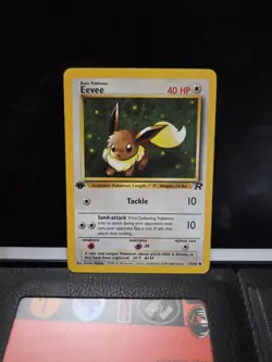 POKEMON EEVEE 55/82 1ST EDITION TEAM ROCKET LP-NM - Image 1