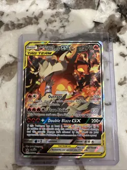 Pokemon Reshiram & Charizard GX TAG TEAM Black Star Promo Holo SM201 Full Art - Image 1