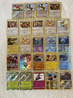 Lot Of 24 Pokemon TCG Holo / Reverse Holo Cards Eevee Sm184 Rc14/rc25 - Image 1