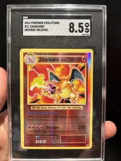 2016 Pokemon Evolutions Charizard Reverse Hollo Foil SGC 8.5 🔥 - Image 1