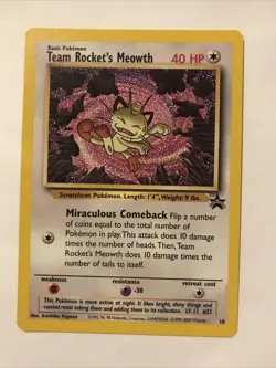 Team Rocket's Meowth Black Star Promo Pokemon Card #18 - Image 1