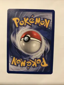 Team Rocket's Meowth Black Star Promo Pokemon Card #18 - Image 2