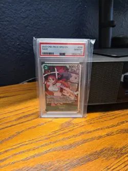2023 ONE PIECE OP02-PARAMOUNT WAR NAMI 036 PSA 10 - Image 1