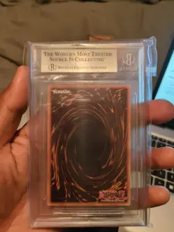 Yu-Gi-Oh X Adidas Dark Magician ADC1-EN001 Beckett 8.5 NM-MT+ - Image 2
