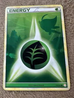 2010 Pokemon TCG HGSS Celebi Grass Energy Regular Non-holo 115/123 LP - Image 1