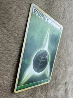 2010 Pokemon TCG HGSS Celebi Grass Energy Regular Non-holo 115/123 LP - Image 4