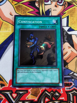 Confiscation mrl-038 Unltd Ed (M/NM+) Super Rare Yu-Gi-Oh! - Image 1