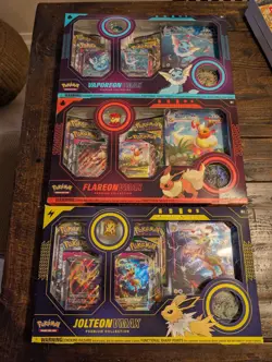 Vaporeon, Jolteon, Flareon VMAX Premium Collection Pokemon TCG Sealed cases - Image 1