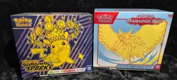 Pokemon Scarlet and Violet: Paradox Rift Roaring Moon ETB And Surging Sparks ETB - Image 1