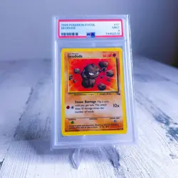 1999 POKEMON FOSSIL #47 GEODUDE PSA 9 - Image 1