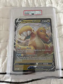 PSA 7- 2021 POKEMON SWSH BLACK STAR PROMO 154 DRAGONITE V JUMBO - Image 1