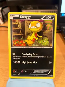 Pokemon TCG Scraggy (Cosmos Holo, BW25) - Black and White Promos – NM - Image 1