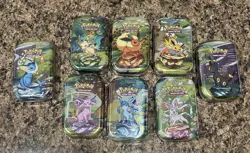 Pokemon Prismatic Evolutions Eeveelution Mini Tin Set (8 Tins) - Image 1