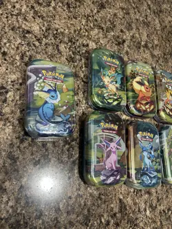 Pokemon Prismatic Evolutions Eeveelution Mini Tin Set (8 Tins) - Image 2