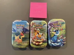 Pokemon lot with Journey mega battle deck and prismatic tins - Image 2