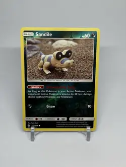 Pokemon TCG Unbroken Bonds 113/214 Sandile Reverse Holo NM - Image 1
