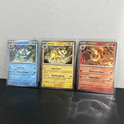 Pokemon TCG Vaporeon & Jolteon & Flareon Cosmos Holo Black Star Promo 3-Card Lot - Image 1