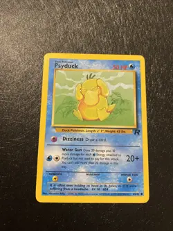 Psyduck 65/82 Team Rocket Pokemon Card - Image 1