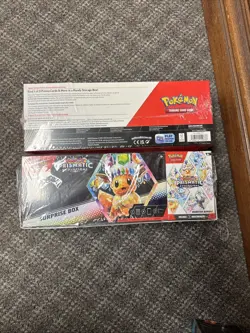 Pokemon Prismatic Evolutions Surprise Box And Booster Bundle - Image 1