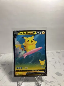 Surfing Pikachu V 008/025 Celebrations - Pokemon Card - NM - Image 1