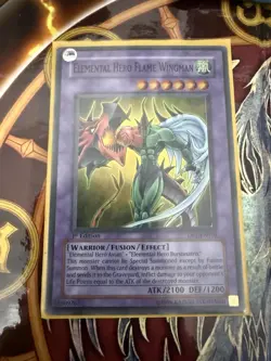 Yu-Gi-Oh TCG Elemental Hero Flame Wingman 1st Edition Super Rare DP1-EN010 - Image 1