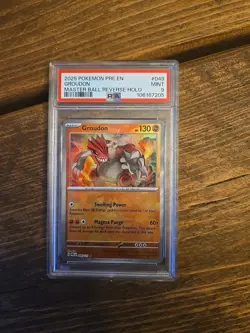 PSA 9 Pokemon Groudon TCG 049/131 Master Ball Prismatic Evolutions - Image 1