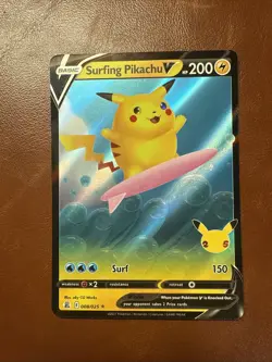 Pokemon TCG Surfing Pikachu v Celebrations Holo Ultra Rare Card 008/025 - Image 1
