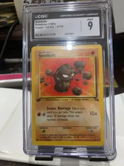 CGC MINT 9 Pokemon Geodude 47/62 1999 Fossil 1st Edition - Image 1